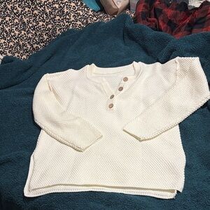 Elegant Cream V-Neck Sweater with Button Accents